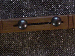 [ 7.5mm round black pearl earrings. ]